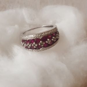 Silver (925) ring with raspberry sapphires.